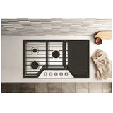 Whirlpool WCGK7536PS Gas Cooktop (handle detail)