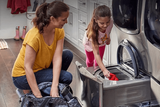 LG WD200CB Laundry Part Pedestal, 29 inch Width, 1.1 cu. ft. Washer Capacity, 2 Temperature Settings, 700 RPM Washer Spin Speed, Black Stainless Steel colour